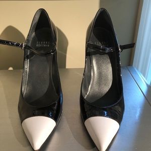 Stuart Weitzman black patent capsize pumps